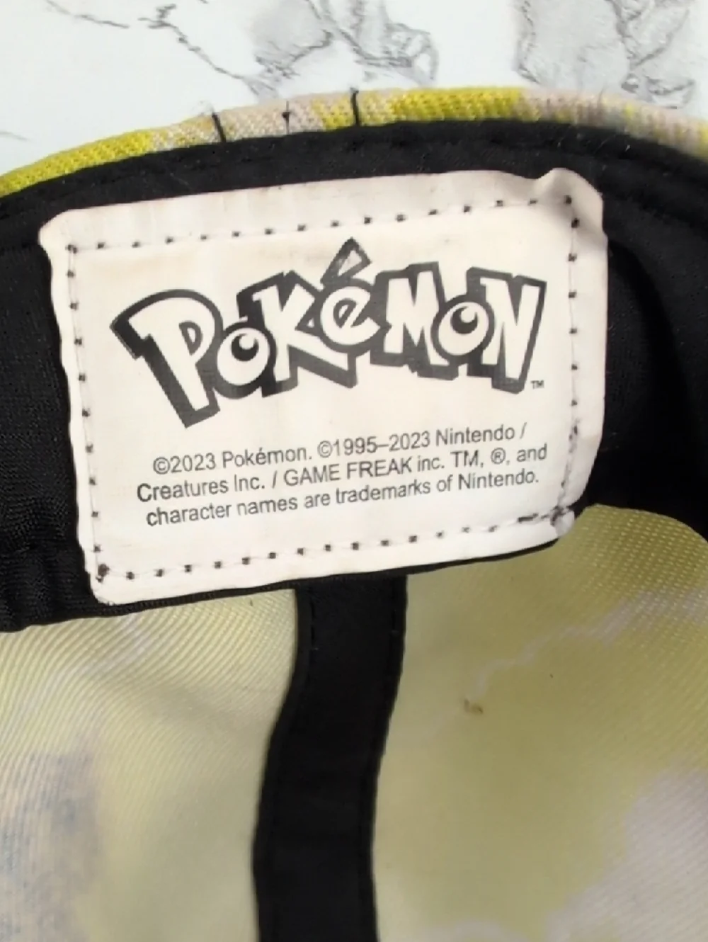 Pokemon Pikachu Tie Dye Lightning Bolt Snapback Hat - Black & Yellow Bioworld​